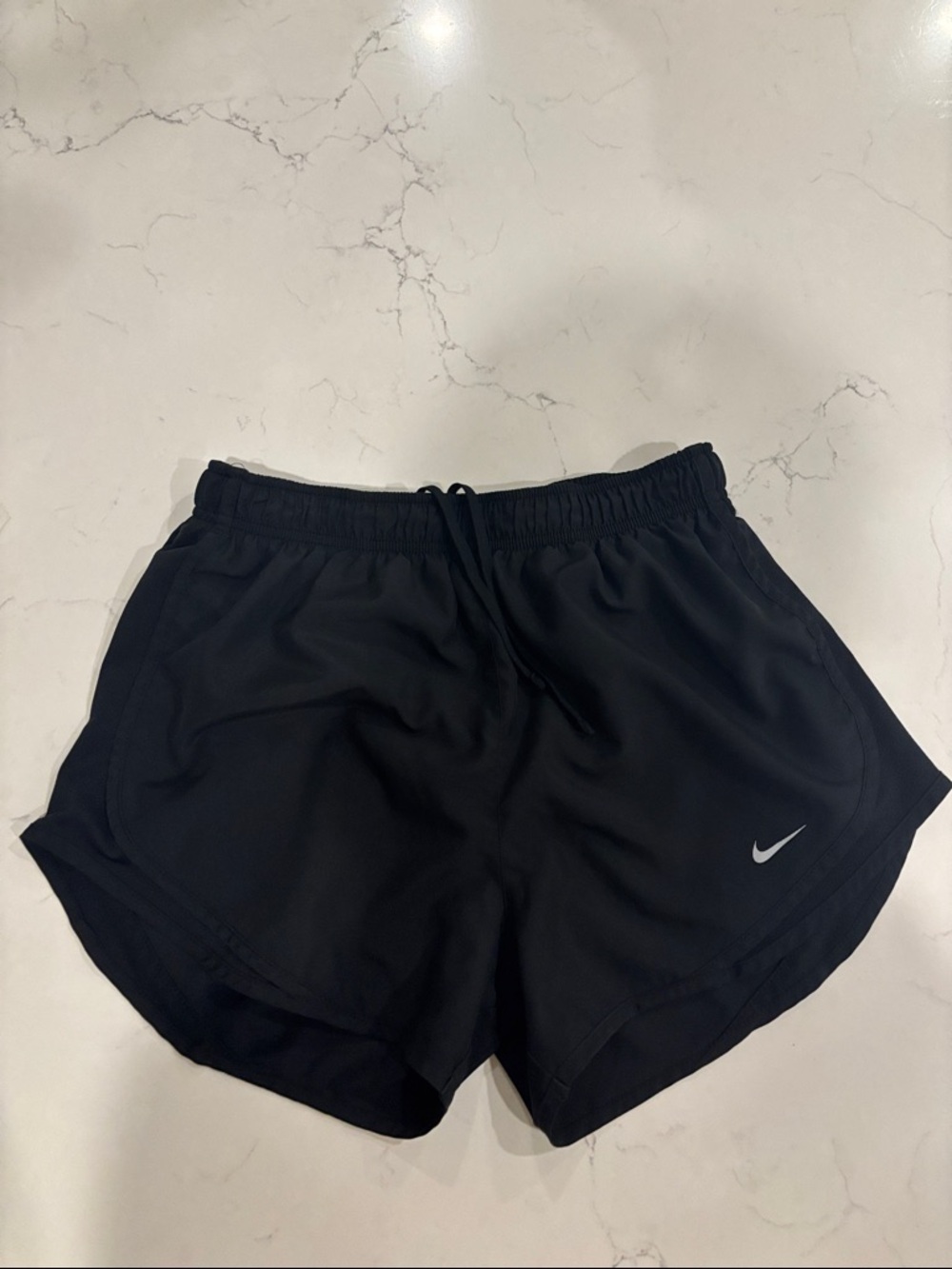 Nike Women’s Black Athletic Shorts with Silver Swoosh